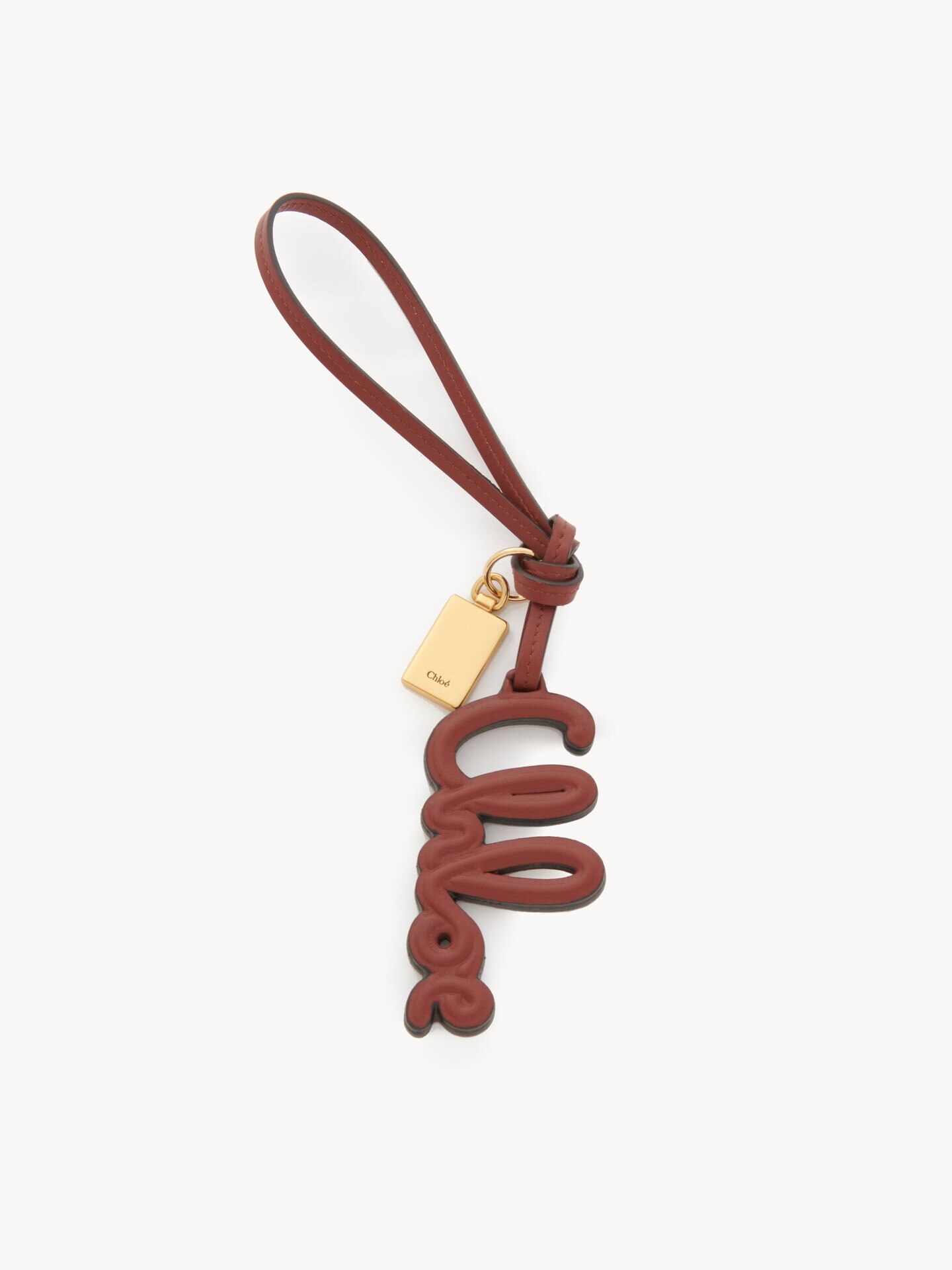 Logo bag charm in shiny leather - 1