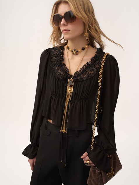 Top cropped de cuello redondo de georgette de seda y encaje