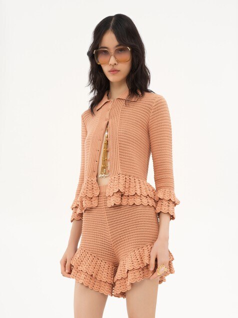 Fitted ruffled cardigan in crochet knit