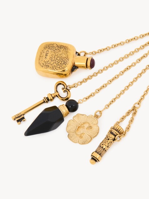 The Château Treasures charm in brass & resin