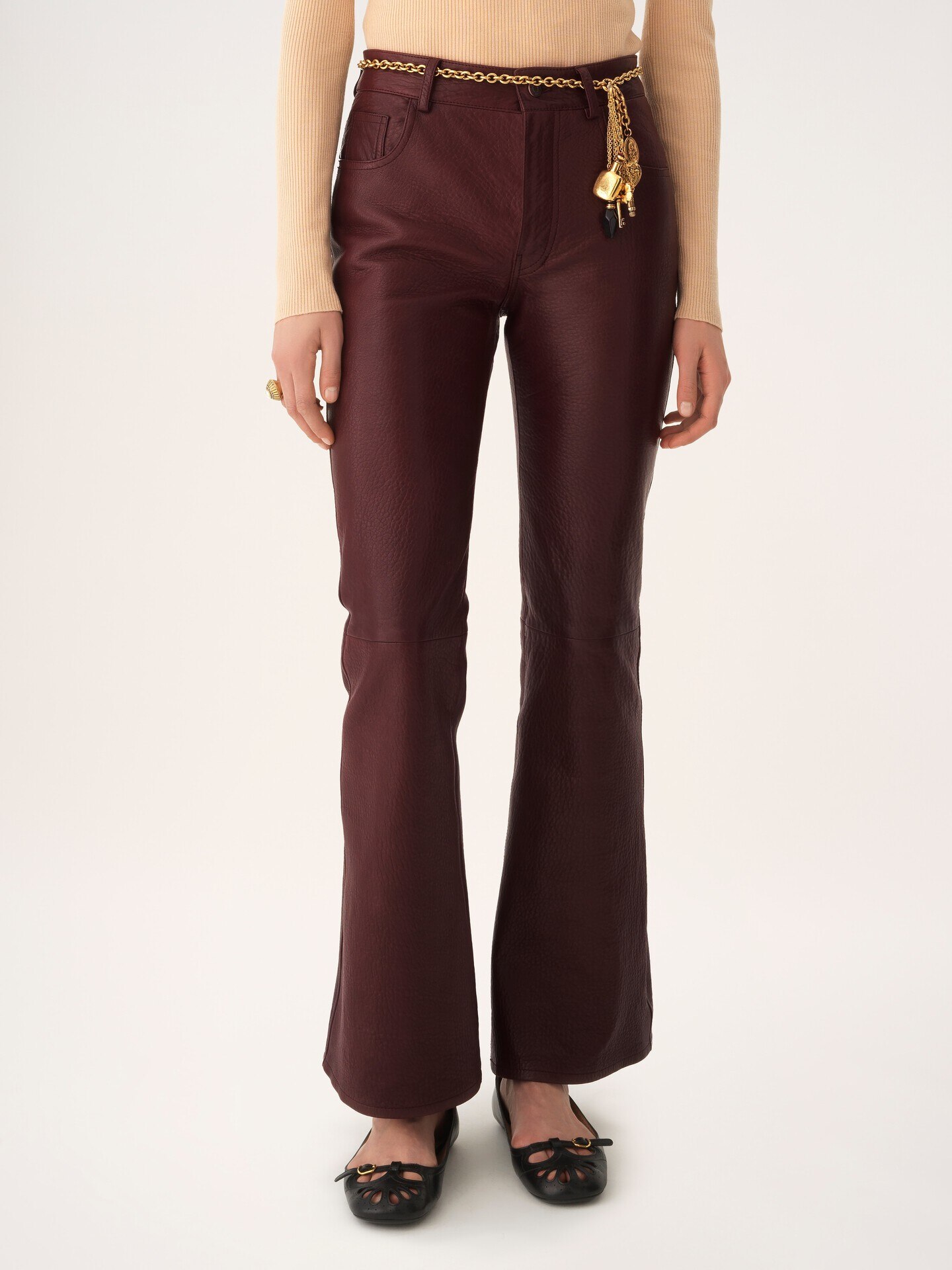 Pantalones acampanados de cuero - 5