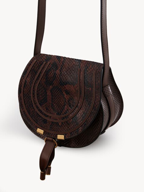 Small Marcie saddle bag in python-effect leather