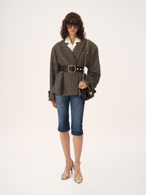 Short riding coat in chevron wool