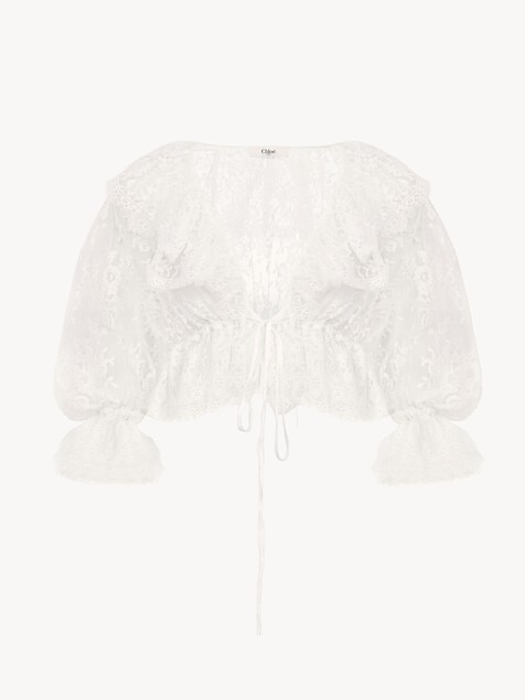 Top cropped de encaje con cuello en V y volantes
