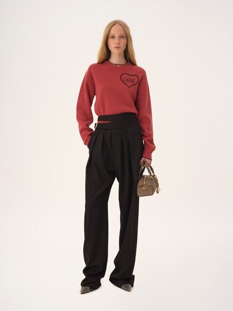 Jersey cropped ajustado con logotipo de punto de lana