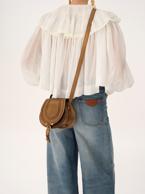 Bolso saddle Marcie peque&ntilde;o de cuero metalizado