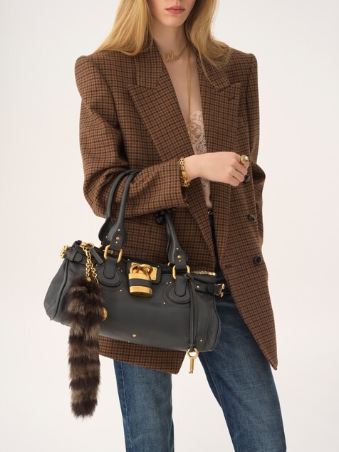 The Treasure Tails charm in shearling