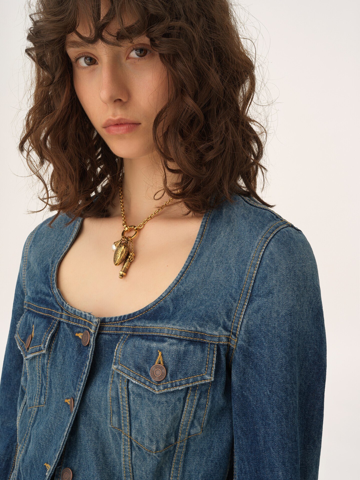 Peplum riding jacket in denim - 7