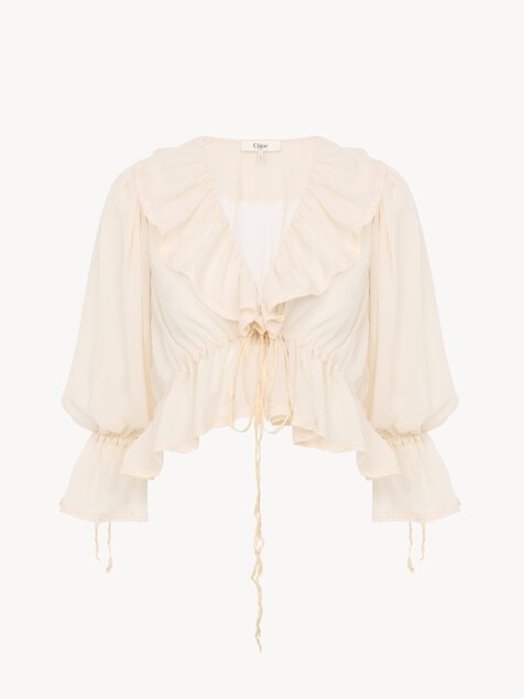 Top cropped con volantes y cuello en&nbsp;V de georgette de seda y encaje