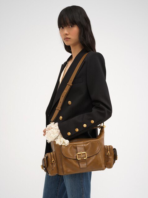 Camera bag in shiny leather