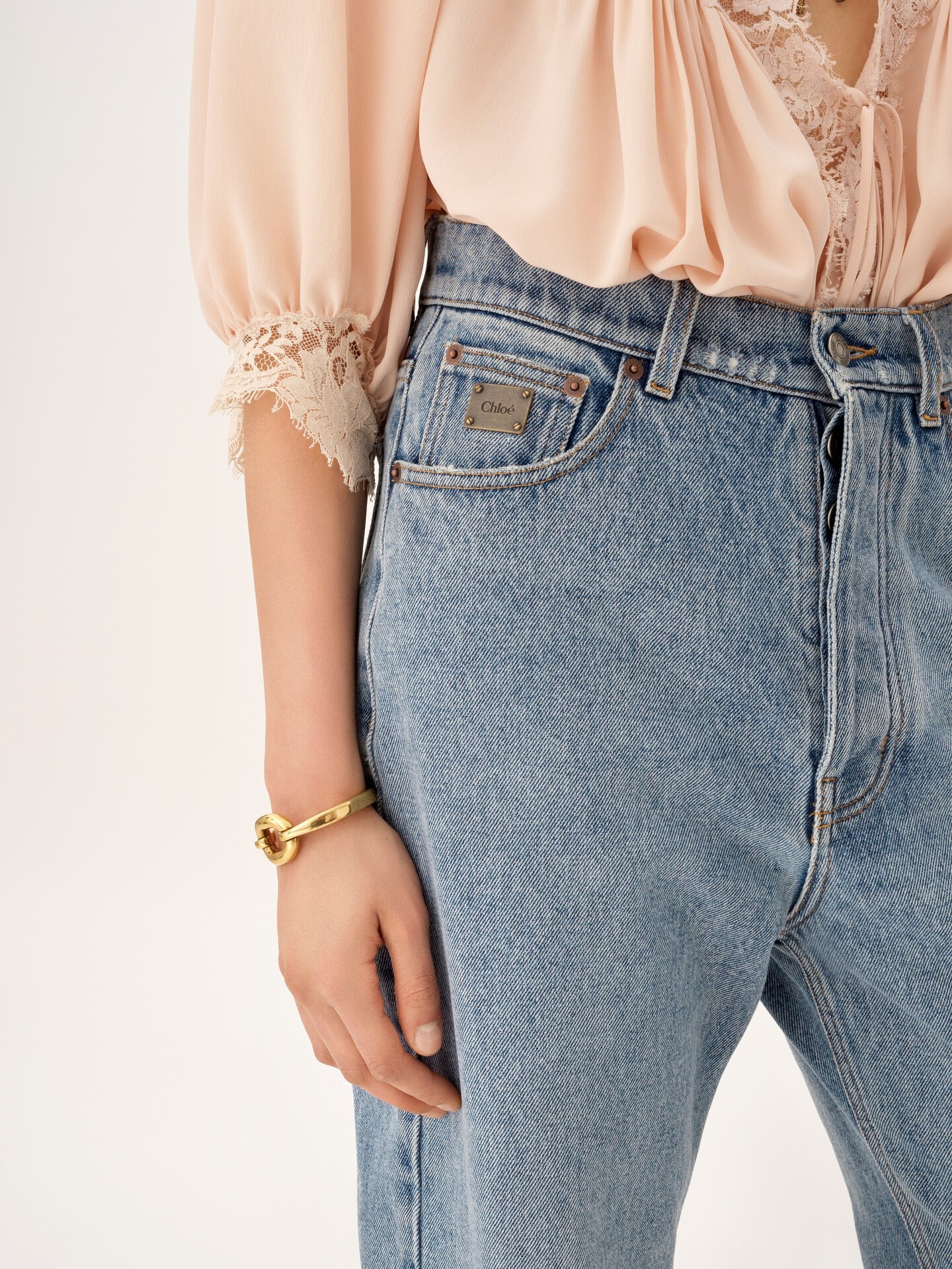 High-rise tapered jeans in denim - 6