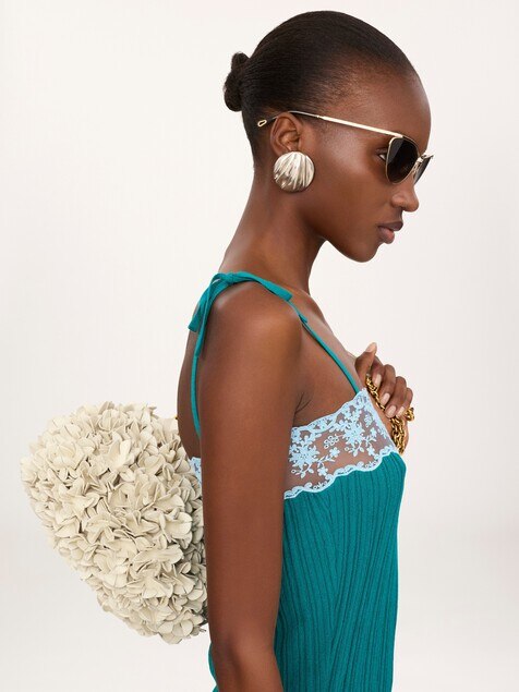 Fitted sleeveless mini dress in a wool knit & lace