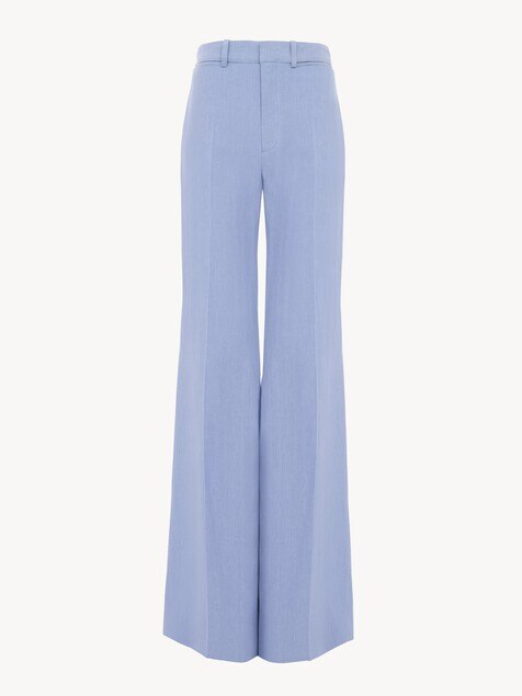 Flared high-rise trousers in linen cr&ecirc;pe