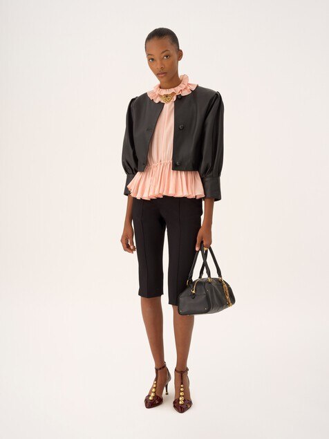 Cropped collarless jacket in leather