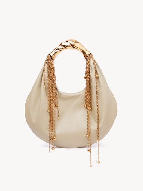 Twisted Shell hobo bag in shiny leather 