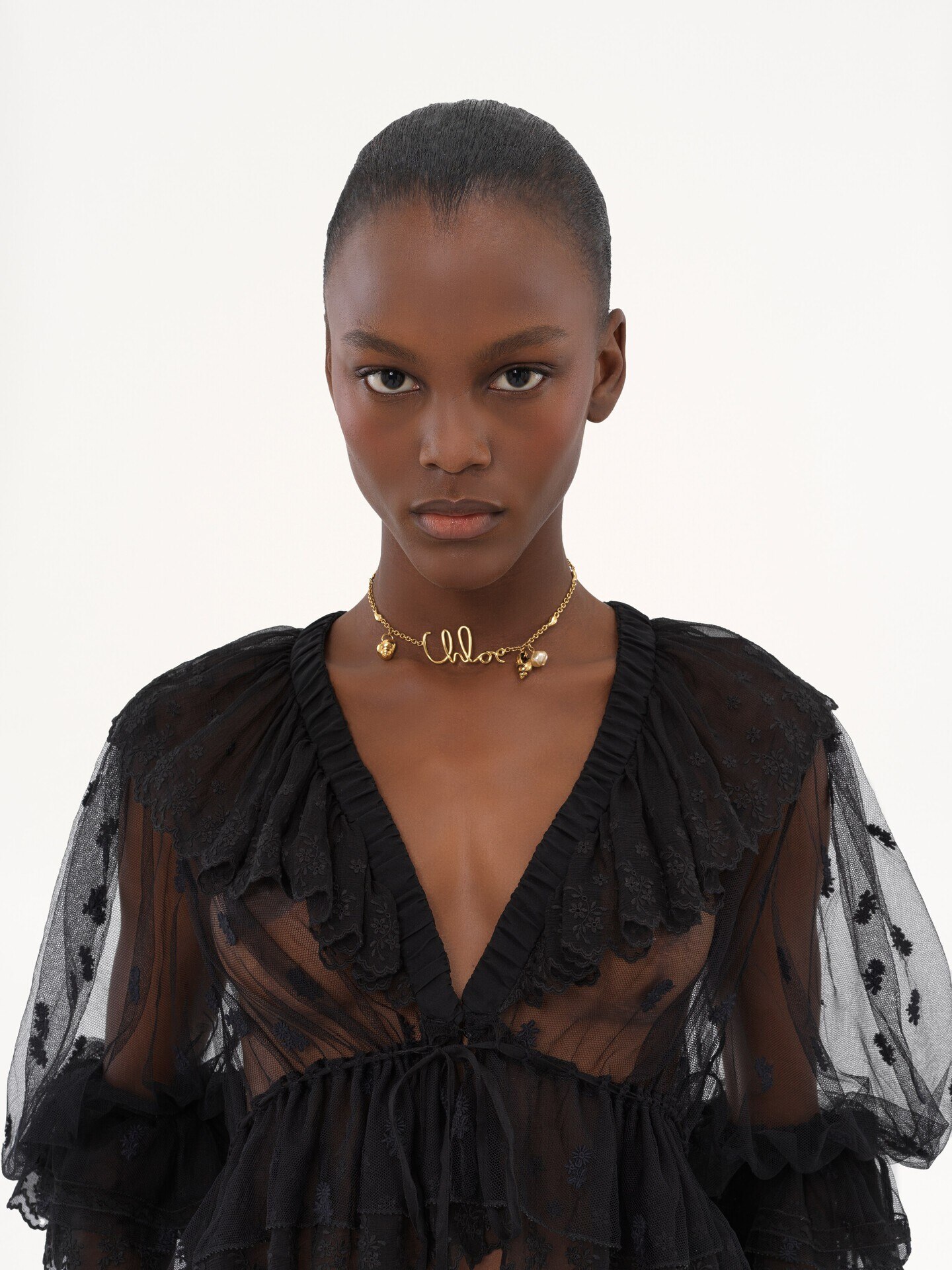 V-neck ruffle top in embroidered lace - 7