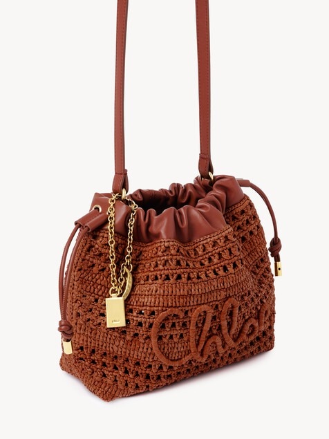 Mini Summer Banana drawstring shoulder bag in raffia