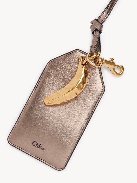 Chloé Symbols Banana tag in metallised leather