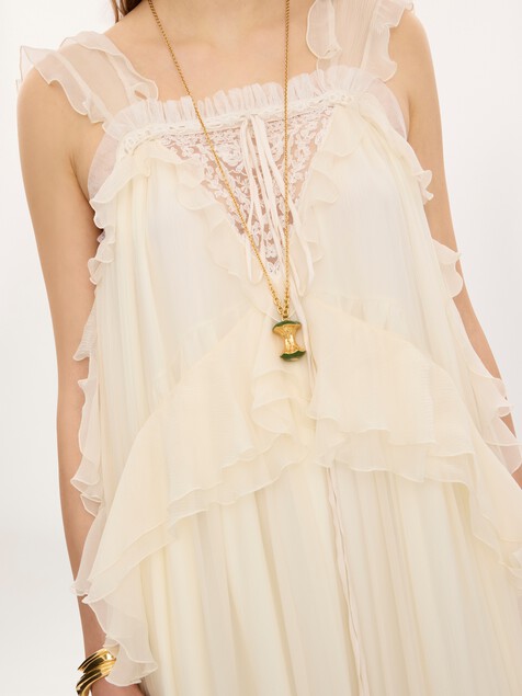 Vestido largo estratificado sin mangas de muselina de seda y encaje