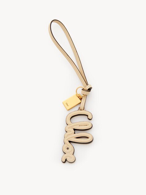 Charm para bolso con logotipo de cuero brillante