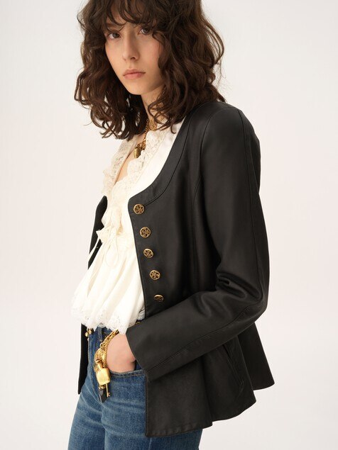 Chaqueta estilo ecuestre con p&eacute;plum de cuero