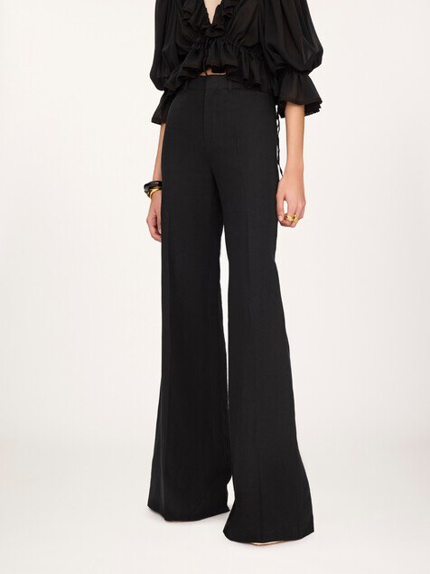 Flared high-rise trousers in linen cr&ecirc;pe