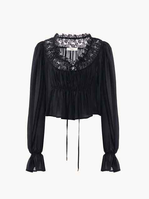 Top cropped de cuello redondo de georgette de seda y encaje