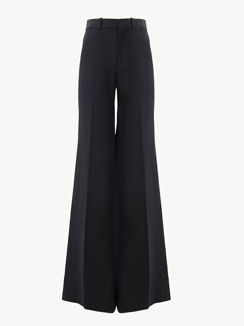 Flared high-rise trousers in linen cr&ecirc;pe