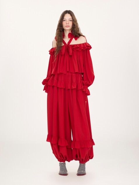 Top con volantes y aberturas de jacquard de seda