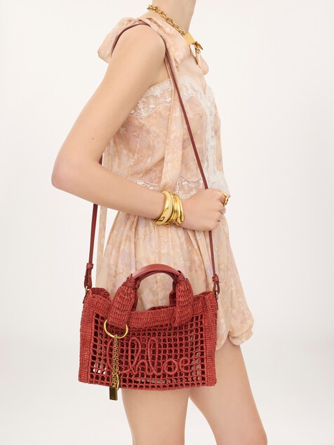 Small Summer Banana east-west tote bag with strap in raffia