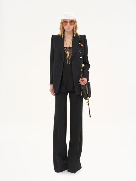 High-rise flared trousers in wool grain de poudre