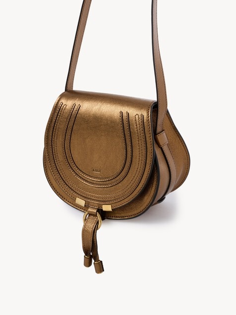 Small Marcie saddle bag in metallized leather